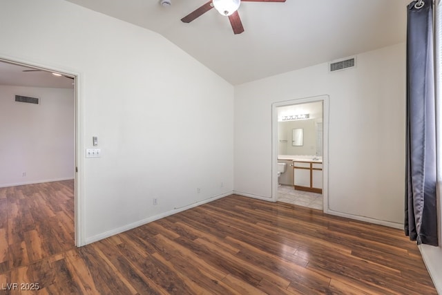4960 Harrison Dr Unit 214, Las Vegas, NV 89120 - empty room featuring ceiling fan, vaulted ceiling, wood finished floors, and baseboards