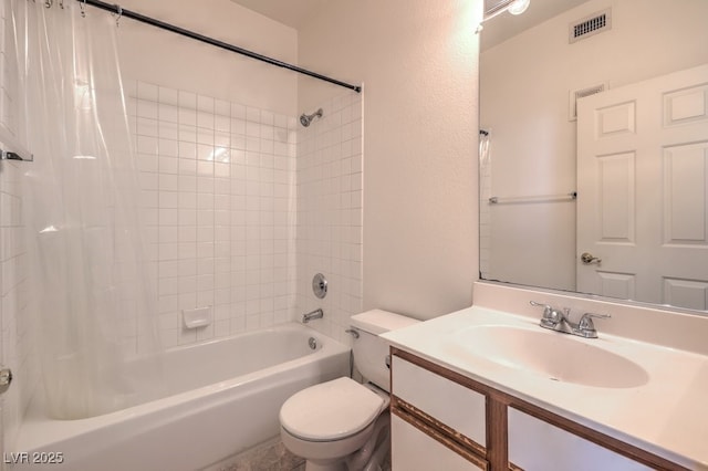 4960 Harrison Dr Unit 214, Las Vegas, NV 89120 - full bathroom featuring toilet, shower / bath combination with curtain, vanity, and a textured wall