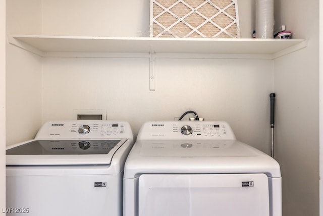 4960 Harrison Dr Unit 214, Las Vegas, NV 89120 - laundry area with washer and clothes dryer