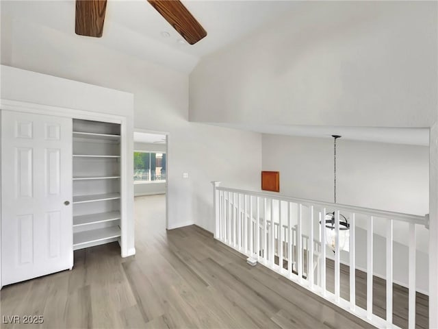 8632 Skyward Ct, Las Vegas, NV 89145 - corridor with wood finished floors, high vaulted ceiling, and baseboards