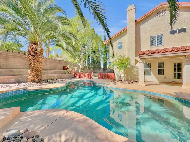 8632 Skyward Ct, Las Vegas, NV 89145 - view of pool with a fenced backyard and a patio