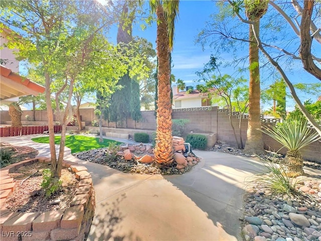 8632 Skyward Ct, Las Vegas, NV 89145 - fenced backyard with a patio