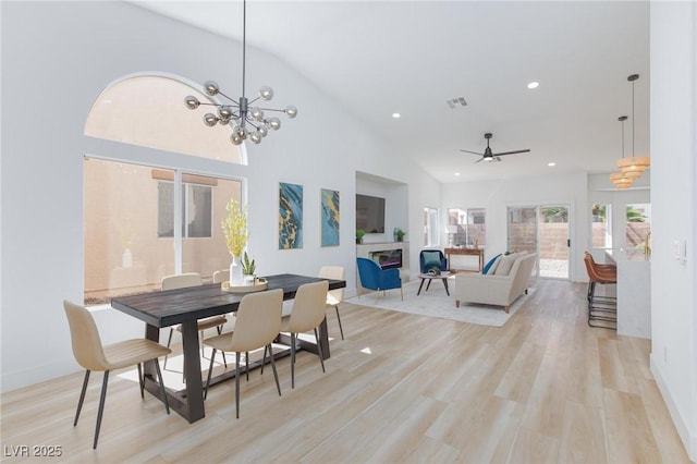 4176 Demoline Cir, Las Vegas, NV 89141 - dining room with light wood-style floors, recessed lighting, a ceiling fan, a chandelier, and lofted ceiling