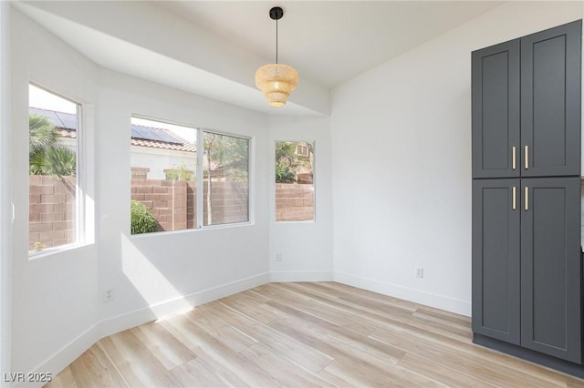 4176 Demoline Cir, Las Vegas, NV 89141 - spare room featuring healthy amount of natural light and light wood-type flooring