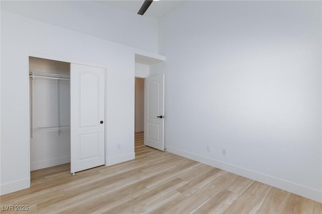 4176 Demoline Cir, Las Vegas, NV 89141 - unfurnished bedroom with a closet, wood finished floors, and ceiling fan