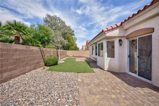 4176 Demoline Cir, Las Vegas, NV 89141 - fenced backyard with a patio