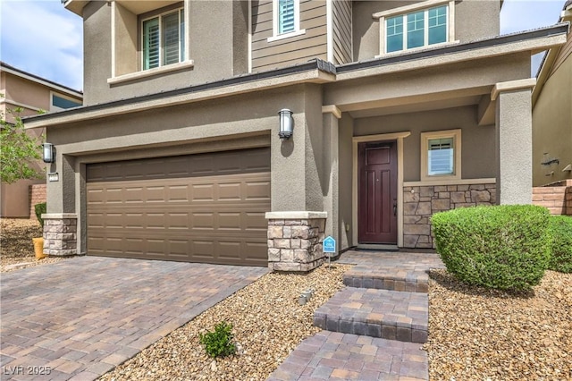 2711 Evolutionary Ln, Las Vegas, NV 89138 - entrance to property featuring stone siding, stucco siding, and an attached garage