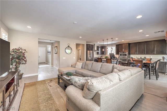 2711 Evolutionary Ln, Las Vegas, NV 89138 - living area with recessed lighting, light wood-type flooring, and baseboards