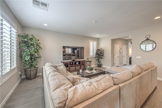 2711 Evolutionary Ln, Las Vegas, NV 89138 - living area featuring light wood finished floors, baseboards, and recessed lighting