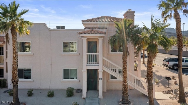 1928 Las Palmas Ln Unit 228, Laughlin, NV 89029 - view of building exterior featuring stairs and central AC unit