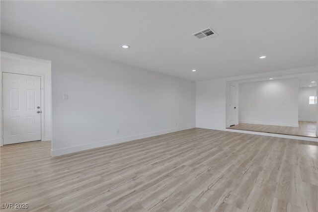 4404 Hillcrest Ave, Las Vegas, NV 89102 - spare room featuring recessed lighting, light wood-style floors, and baseboards