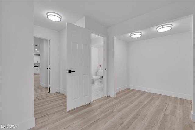 4404 Hillcrest Ave, Las Vegas, NV 89102 - corridor with wood finished floors and baseboards