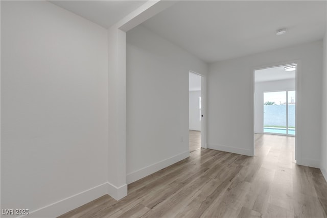 4404 Hillcrest Ave, Las Vegas, NV 89102 - unfurnished room featuring baseboards and light wood-style flooring