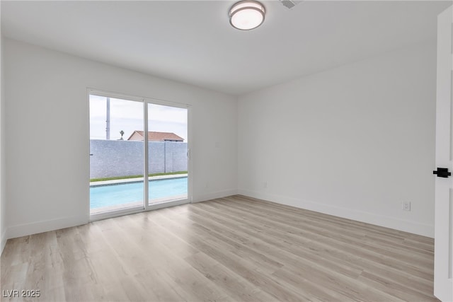 4404 Hillcrest Ave, Las Vegas, NV 89102 - spare room featuring light wood-style floors and baseboards