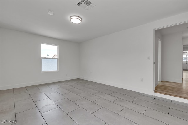 4404 Hillcrest Ave, Las Vegas, NV 89102 - spare room featuring light tile patterned floors, baseboards, and a smoke detector