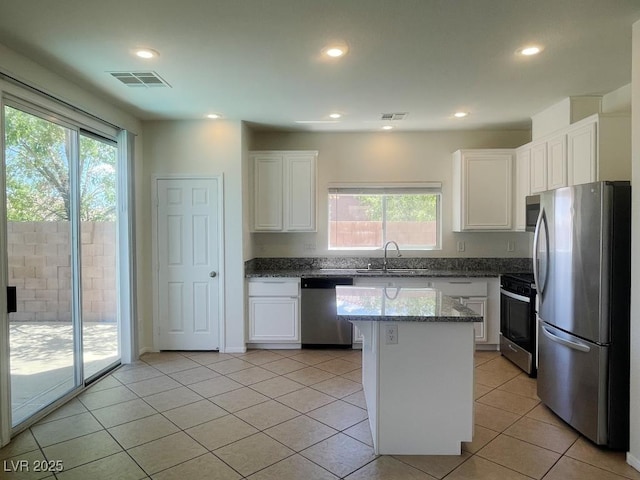 740 White Grotto St, Las Vegas, NV 89138 - kitchen featuring appliances with stainless steel finishes, a sink, plenty of natural light, white cabinetry, and recessed lighting