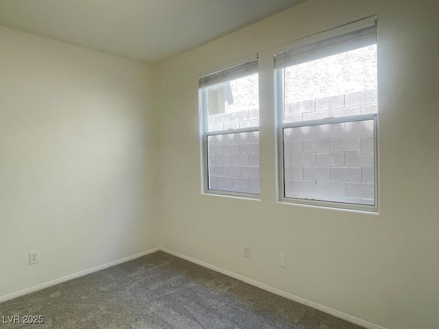 740 White Grotto St, Las Vegas, NV 89138 - unfurnished room with baseboards and dark colored carpet