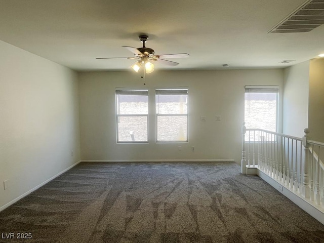 740 White Grotto St, Las Vegas, NV 89138 - empty room featuring healthy amount of natural light, a ceiling fan, carpet, and baseboards