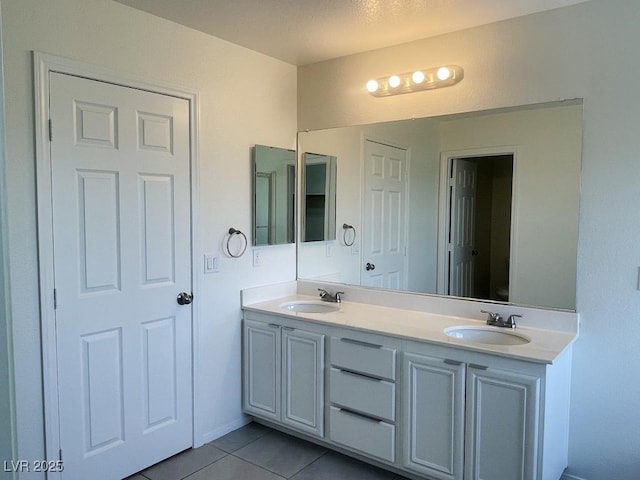 740 White Grotto St, Las Vegas, NV 89138 - full bathroom featuring tile patterned flooring and double vanity