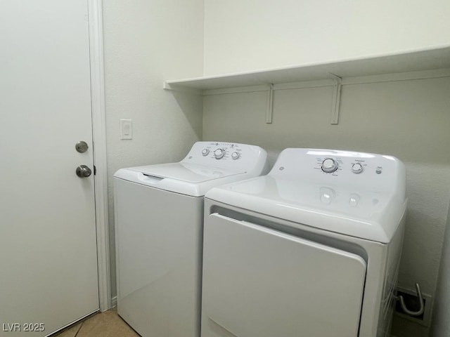740 White Grotto St, Las Vegas, NV 89138 - washroom with washing machine and dryer and light tile patterned flooring