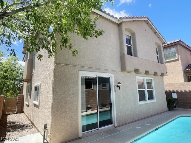 740 White Grotto St, Las Vegas, NV 89138 - rear view of house featuring stucco siding