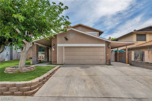 601 Cragin Park Dr, Las Vegas, NV 89107 - mid-century modern home featuring driveway, a garage, and brick siding