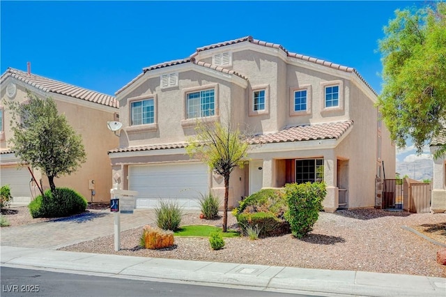 412 Orchid Oasis Ave, North Las Vegas, NV 89031 - view of front facade with a tiled roof, a garage, stucco siding, and concrete driveway