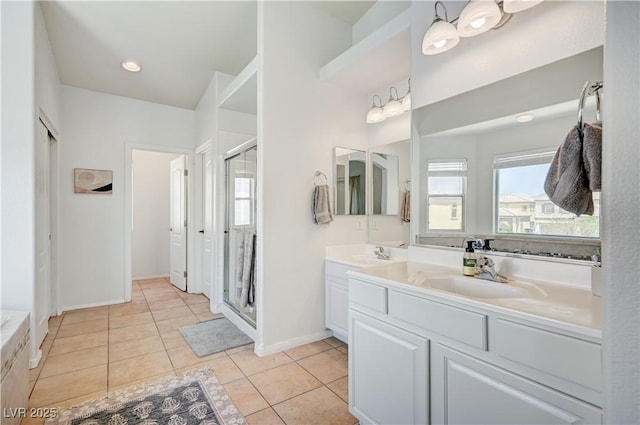 412 Orchid Oasis Ave, North Las Vegas, NV 89031 - bathroom with double vanity, tile patterned floors, and a stall shower