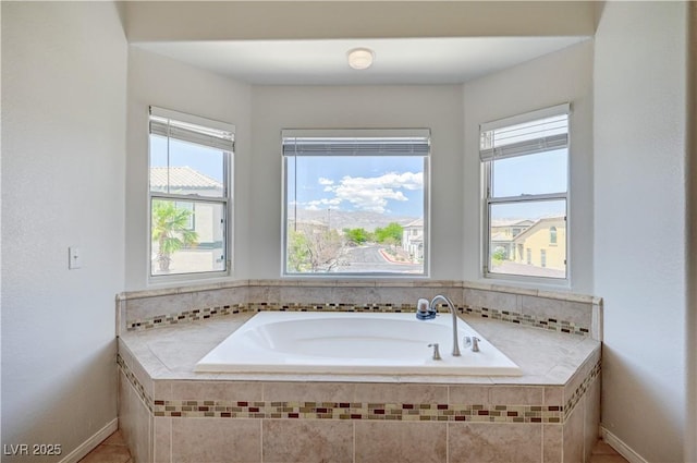412 Orchid Oasis Ave, North Las Vegas, NV 89031 - full bath featuring plenty of natural light, a garden tub, and tile patterned floors