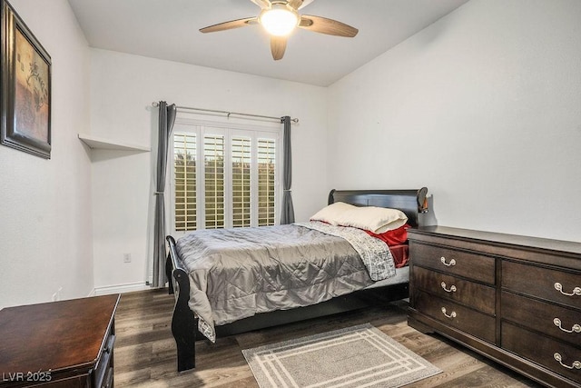 499 Eagle Vista Dr, Henderson, NV 89012 - bedroom featuring wood finished floors, a ceiling fan, and baseboards