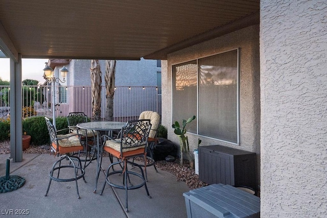 499 Eagle Vista Dr, Henderson, NV 89012 - view of patio / terrace featuring outdoor dining area
