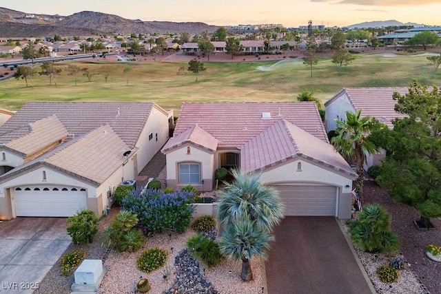499 Eagle Vista Dr, Henderson, NV 89012 - aerial view at dusk of a mountain view, a residential view, and view of golf course
