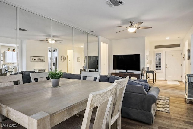 499 Eagle Vista Dr, Henderson, NV 89012 - dining space with ceiling fan and wood finished floors