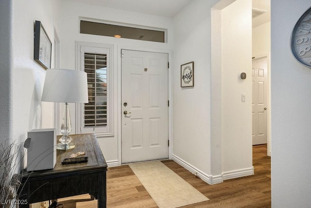 499 Eagle Vista Dr, Henderson, NV 89012 - entrance foyer with wood finished floors and baseboards
