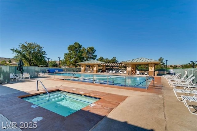 499 Eagle Vista Dr, Henderson, NV 89012 - community pool featuring a hot tub, a patio area, and a gazebo