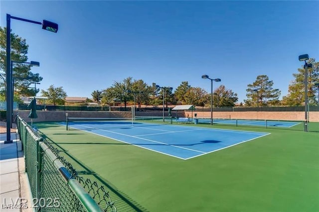 499 Eagle Vista Dr, Henderson, NV 89012 - view of tennis court with community basketball court