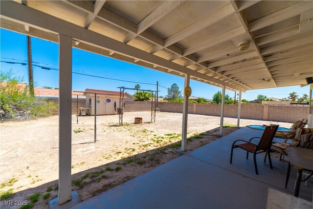 475 E Robindale Rd, Las Vegas, NV 89123 - fenced backyard featuring a patio