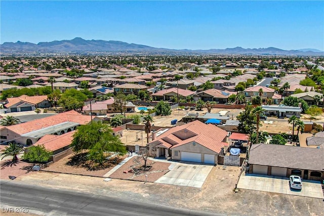 475 E Robindale Rd, Las Vegas, NV 89123 - aerial perspective of suburban area featuring a mountainous background