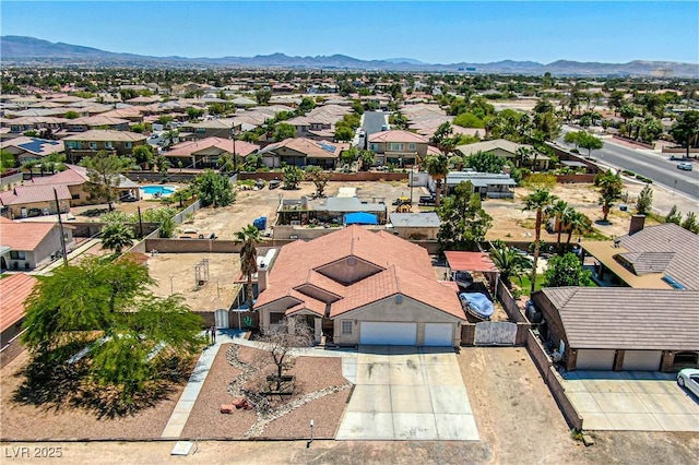 475 E Robindale Rd, Las Vegas, NV 89123 - aerial perspective of suburban area featuring a mountainous background