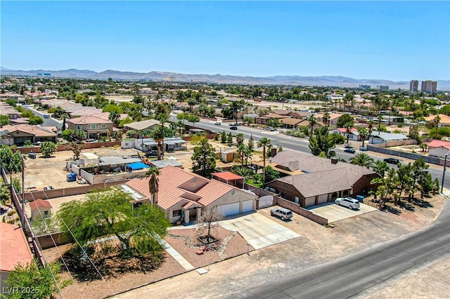 475 E Robindale Rd, Las Vegas, NV 89123 - aerial view of residential area with a mountain backdrop