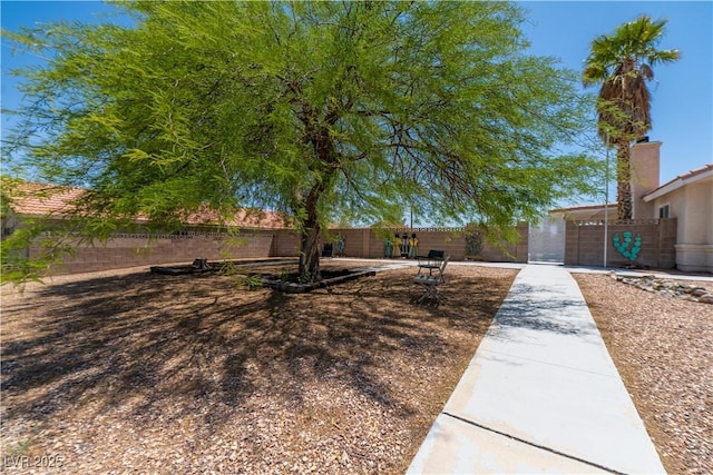 475 E Robindale Rd, Las Vegas, NV 89123 - view of front of home with a fenced backyard