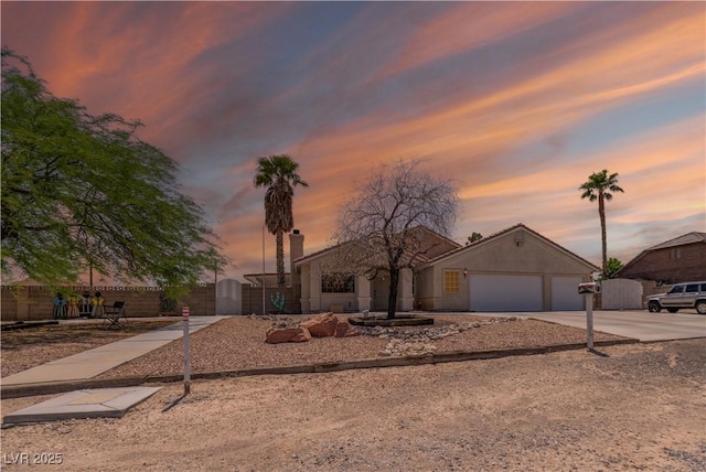 475 E Robindale Rd, Las Vegas, NV 89123 - view of front of house with a garage and concrete driveway