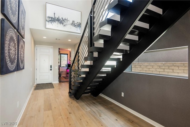 2750 Evolutionary Ln, Las Vegas, NV 89138 - entryway featuring wood-type flooring, stairway, baseboards, and recessed lighting