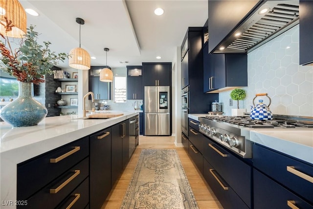 2750 Evolutionary Ln, Las Vegas, NV 89138 - kitchen featuring custom range hood, a sink, light countertops, stainless steel appliances, and recessed lighting