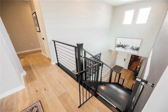 2750 Evolutionary Ln, Las Vegas, NV 89138 - stairs featuring hardwood / wood-style floors and baseboards