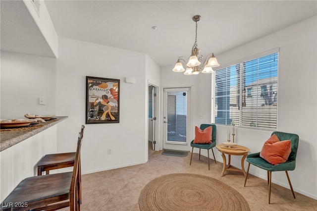 50 Aura De Blanco St Unit 2104, Henderson, NV 89074 - living area with a chandelier, baseboards, and light tile patterned flooring