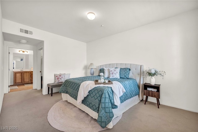 50 Aura De Blanco St Unit 2104, Henderson, NV 89074 - carpeted bedroom featuring connected bathroom and baseboards