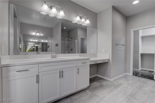 1040 Via Panfilo Ave, Henderson, NV 89011 - bathroom featuring a shower stall, vanity, and baseboards