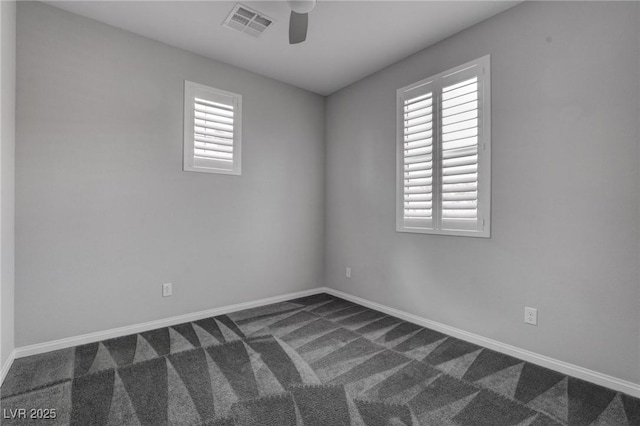 1040 Via Panfilo Ave, Henderson, NV 89011 - unfurnished room with a ceiling fan, dark colored carpet, and baseboards