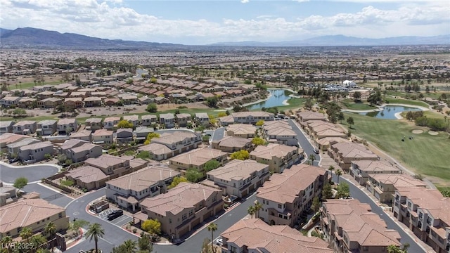 1040 Via Panfilo Ave, Henderson, NV 89011 - aerial overview of property's location with nearby suburban area, a water and mountain view, and a local golf course
